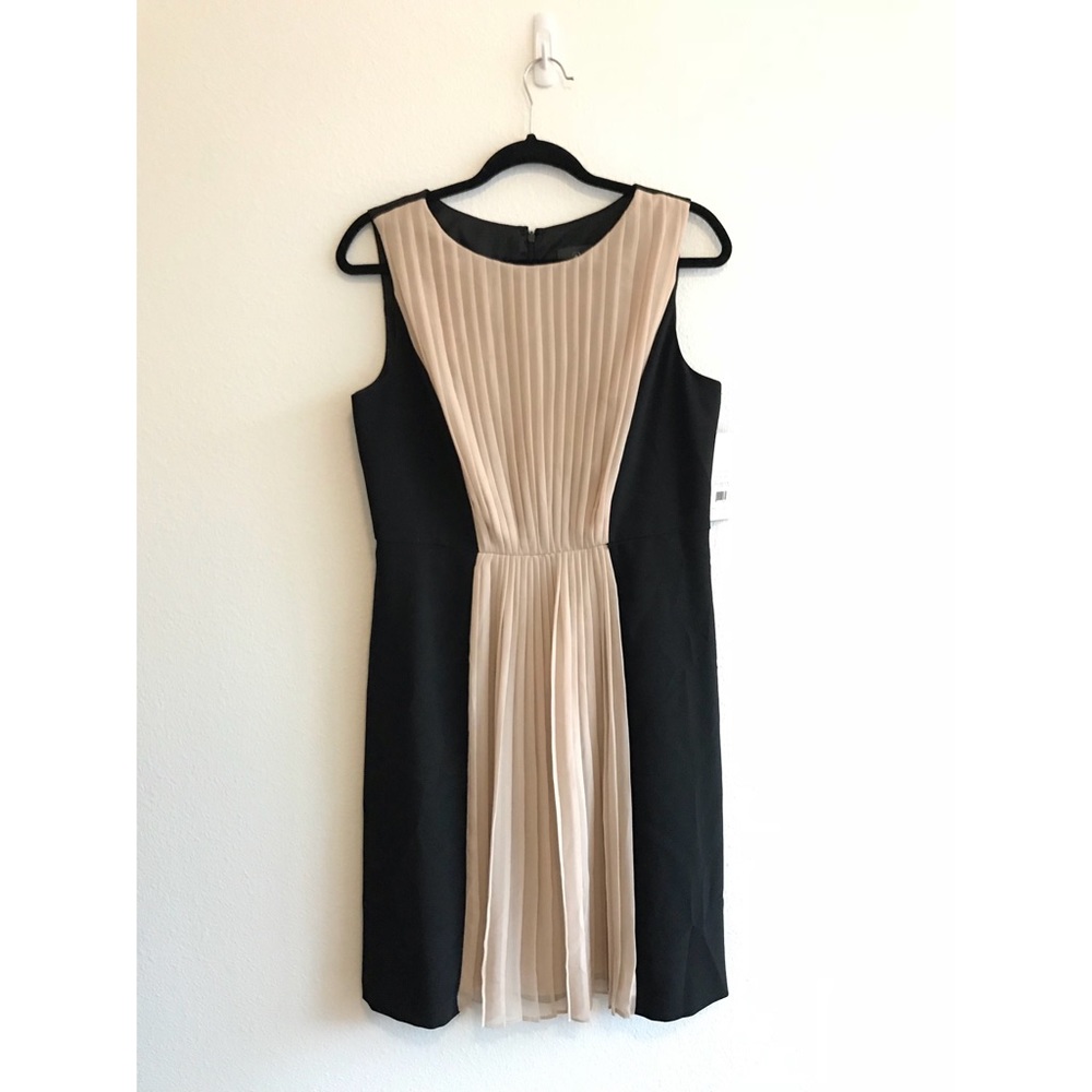 Pleated black sheath dress